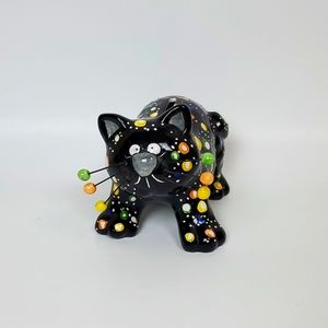 Porcelain cat piggy bank